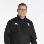 a man in a black jacket