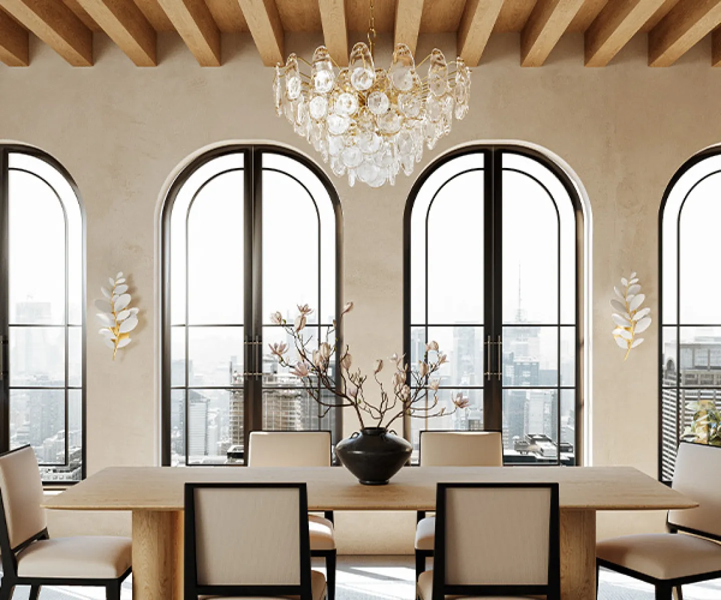 Modern dining room with large arched windows, wooden beams, elegant chandelier, and a vase with branches.
