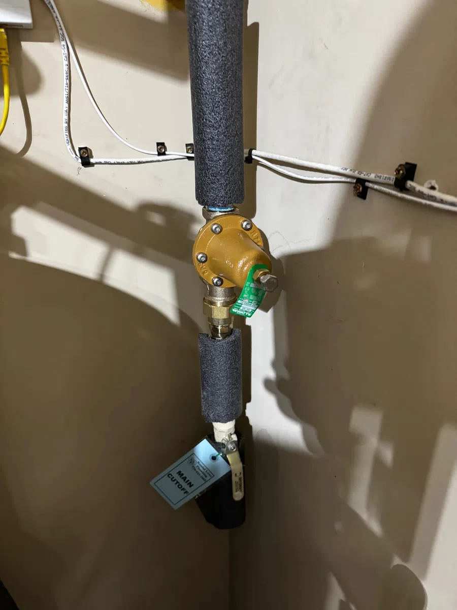 Insulated pipe with a brass valve installed by Marietta plumber