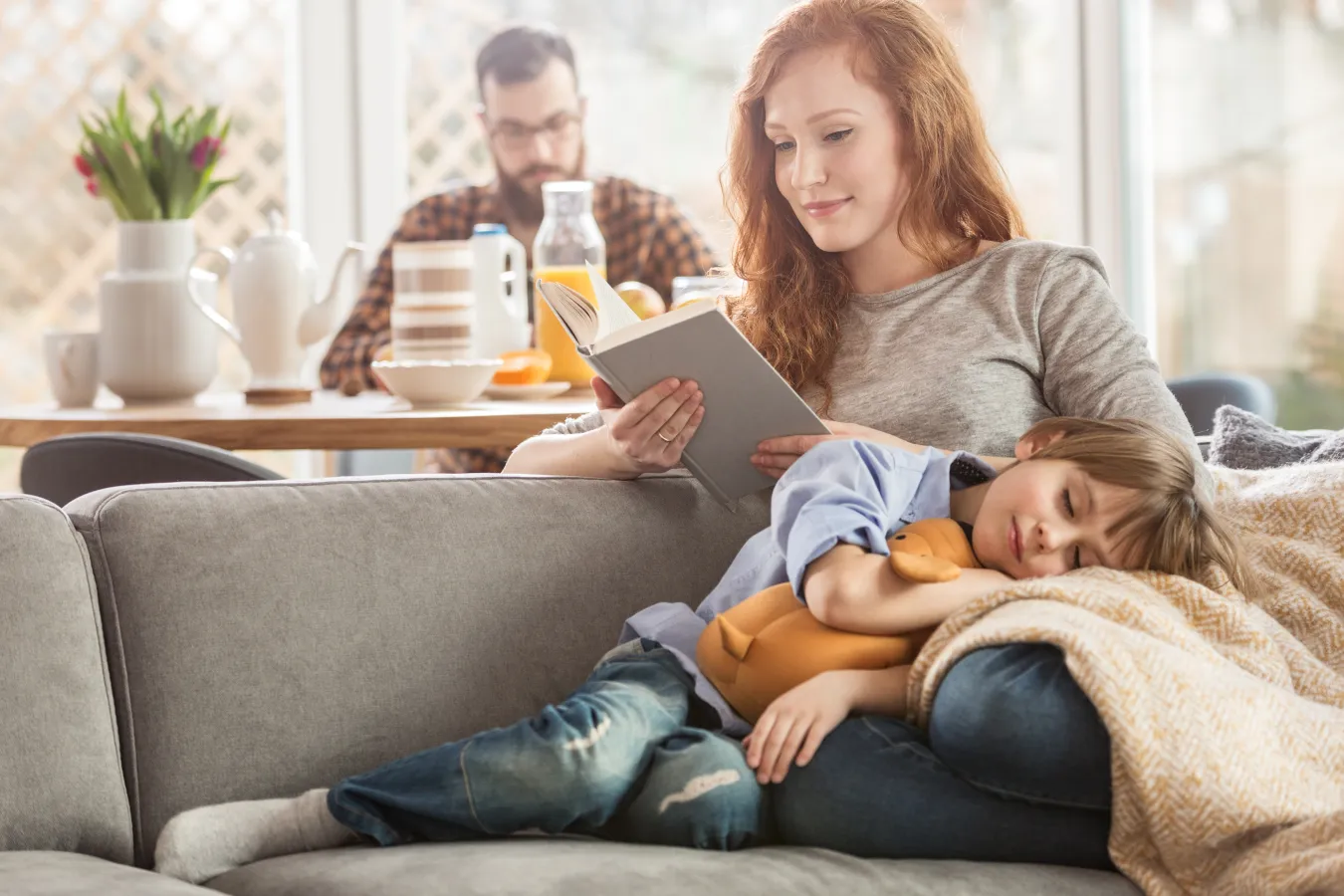 mother and son on couch