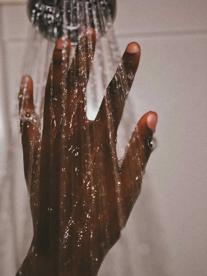 a hand holding a plastic bag