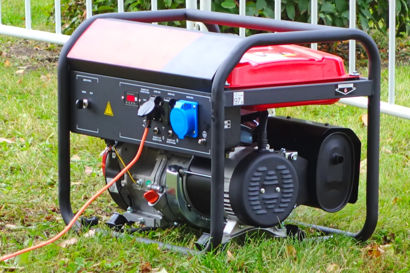 a black and red vehicle with a large engine