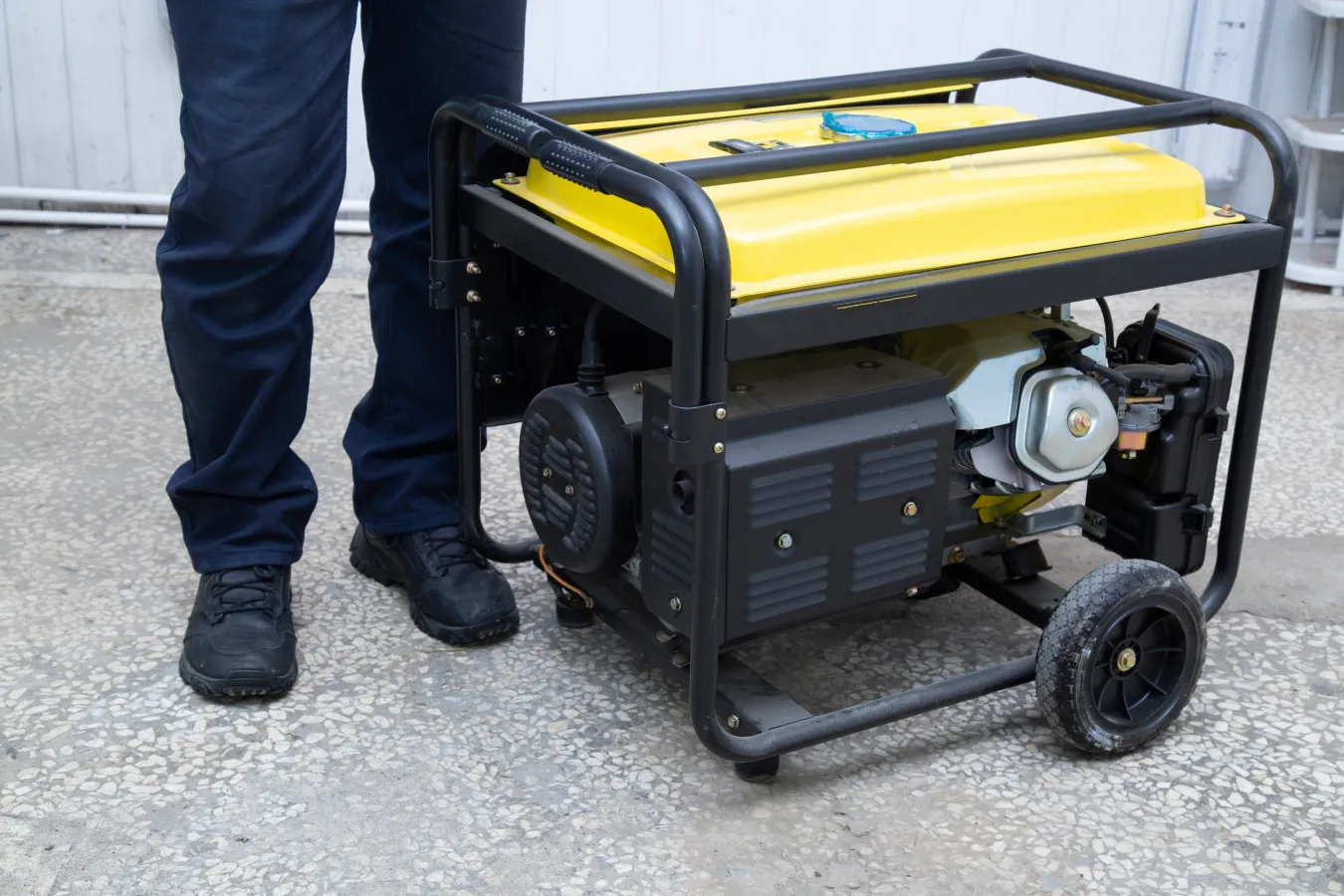 a person standing next to a machine