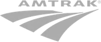 Amtrak logo with gray stylized railroad tracks and uppercase lettering on transparent background.