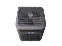 Gray Carrier outdoor air conditioning unit with visible fan and protective grille from top view.