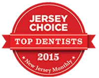 Red badge with ribbon stating Jersey Choice Top Dentists 2015 by New Jersey Monthly