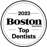 2023 Boston Magazine Top Dentists badge in a black and white circular design
