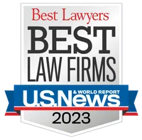 2023 Best Law Firms badge by Best Lawyers and U.S. News & World Report with red, black, blue, and white colors