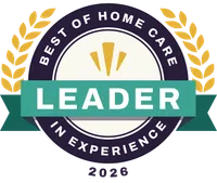 Badge showing 'Best of Home Care Leader in Experience 2026' with laurel wreaths and teal ribbon.