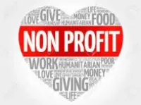 Heart-shaped word cloud with 'Non Profit' in red and white surrounded by words like giving, food, love, and humanitarian.