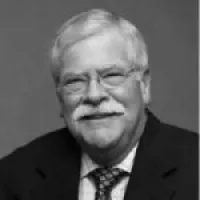 a man wearing a suit and tie