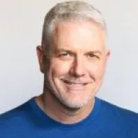 a man smiling for the camera