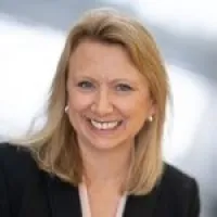 a woman smiling for the camera