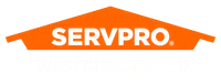 SERVPRO logo with orange roof shape and bold text WEST CHELMSFORD below