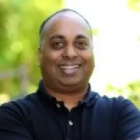 a man smiling for the camera