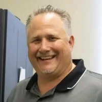 a man smiling for the camera