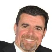 a man smiling for the camera