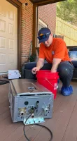 Estes Plumber with a tankless water heater