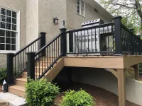 a building with a deck and a railing