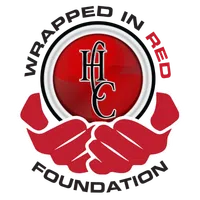 Red hands holding a red circle with HHC initials, surrounded by the words Wrapped in Red Foundation.