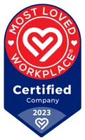 Most Loved Workplace certified company badge for 2023 with red heart logo and blue background