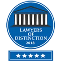 Blue circular badge with courthouse columns and text Lawyers of Distinction 2018 with five-star rating below.