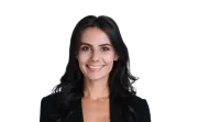 Smiling professional woman with long dark hair wearing a black blazer against a transparent background