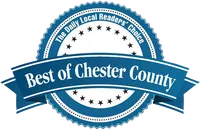 Blue and white badge with stars and ribbon stating Best of Chester County awarded by The Daily Local Readers' Choice