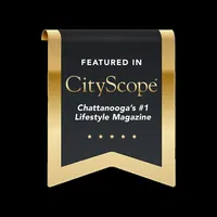 Elegant black and gold ribbon banner featuring CityScope Chattanooga's #1 lifestyle magazine with five gold stars.