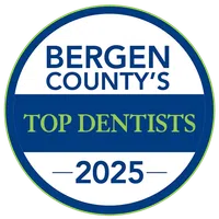 Bergen County's Top Dentists 2025 badge in blue, white, and green circular design.