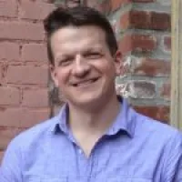 a man smiling for the camera
