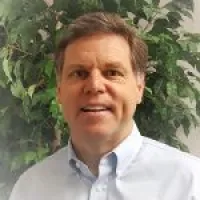 a man smiling for the camera