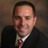 a man smiling for the camera