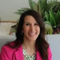 a person smiling for the camera