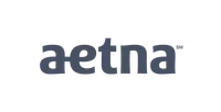 Aetna logo in dark blue lowercase letters on a transparent background