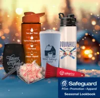 Collection of custom drinkware and promotional items with winter background and festive lights.