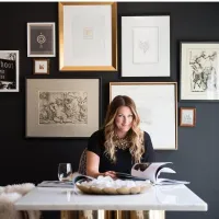 a woman sitting at a table