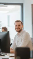 a person smiling at the camera