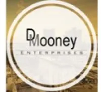 Mooney Enterprises logo with stylized text inside double gold circular border over cityscape background