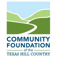 Logo of Community Foundation of the Texas Hill Country with stylized green hills and blue sky.