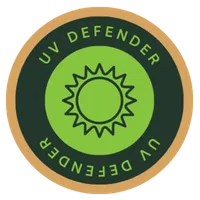 Circular logo with a sun icon in the center and text 'UV DEFENDER' around it in green and black colors.