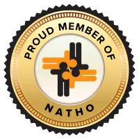 Gold emblem with text Proud Member of NATHO and an abstract design with orange and black figures.
