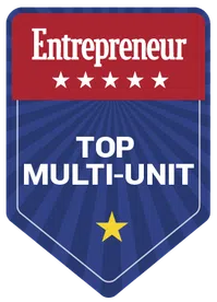 Entrepreneur Top Multi-Unit award badge with stars on red and blue background.