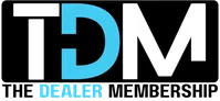 TDM Dealer logo with bold white and blue letters on black background.