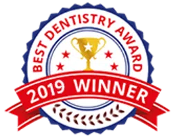 2019 Best Dentistry Award winner badge with gold trophy, red ribbon, and laurel wreath accents