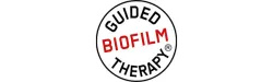 Guided Biofilm Therapy logo with black circular text surrounding red BIOFILM in the center on white background