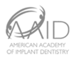 Logo of the American Academy of Implant Dentistry featuring stylized text and circular design