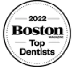 2022 Boston Magazine Top Dentists award badge in a circular design with bold text