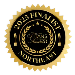 Gold and black circular seal for 2025 Finalist Titans of the Industry Awards Northeast with laurel and trophy icons.