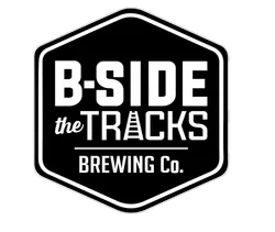 Logo for B-Side the Tracks Brewing Co. with stylized text and track graphic on black background